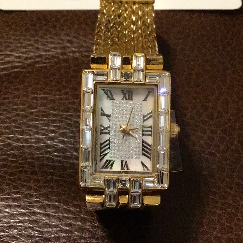NWT,REAL COLLECTIBLES BY ADRIENNE,CUFF WATCH,SIDE OPENING,GOLDTONE WITH CRYSTALS